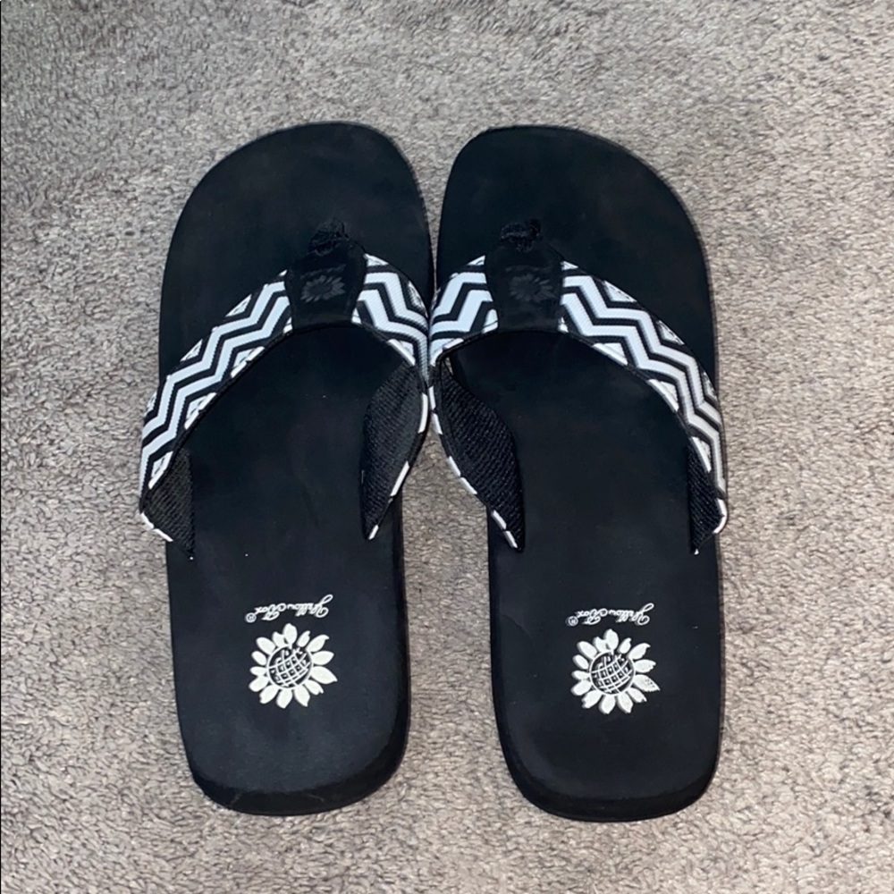 Yellow box flip flops